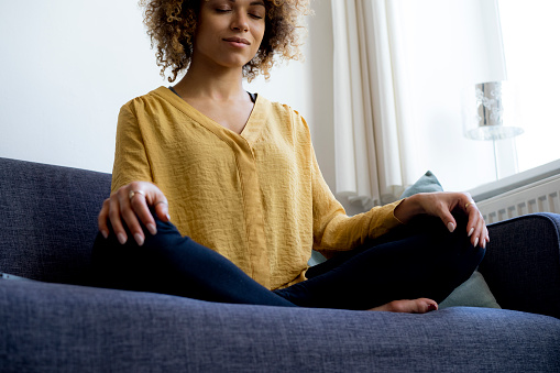 Young woman practising meditation